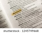 Small photo of The word or phrase Abortionist in a dictionary.