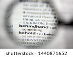 Small photo of The word or phrase behindhand in a dictionary