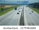 Small photo of KUALA LUMPUR, MALAYSIA : High angles a vehicles move over the highway during the day on September 12, 2018