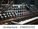 Small photo of Analog synthesizer board in sound recording studio.Professional hi-fi audio equipment for music producer.Retro analog synth device for producing new musical tracks in high quality