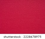 Small photo of Stripedred metalized red paper page background. Perfect designer carton or cardboard texture for making winter season Christmas festival card sheet, text, lettering, wall screen saver or art work.