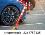 Car bent polyurethane flexible post while parking on crowded parking lot in downtown. Car damaged flexible bollard in parking stalls. Car hit bollard at parking lot, damaged driver side bumper