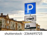 Small photo of Road sign - Parking sign in the city. Parking zone for cars. Parking sign, city on background