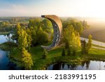 Amazing aerial view of Kirkilai karst lakes and lookout tower in the bright sunny autumn morning, Birzai eldership, Panevezys county, Lithuania