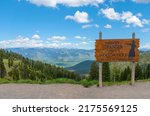 Welcome posted of Jackson hole viewpoint looking down to the valley with the Tetons mountains Wyoming state. 