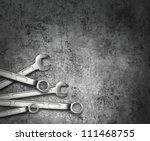 Wrench Spanner Tools On Grunge...