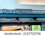Small photo of Portland, Oregon, USA - February 7, 2022: Sign over entrance The Oregonian News store in Portland Airport.