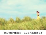 boy-hiking-through-the-tall-grass image - Free stock photo - Public ...