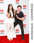 Small photo of LAS VEGAS-SEP 19: Camila Cabello (L) and Shawn Mendes attend the 2015 iHeartRadio Music Festival at MGM Grand Garden Arena Night 2 on September 19, 2015 in Las Vegas, Nevada.