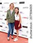 Small photo of BRIDGEHAMPTON, NY-JUL 19: Ali Wentworth (L) and daughter Elliott Stephanopoulos attend the Annual Family Fair at Children's Museum of the East End (CMEE) on July 19, 2014 in Bridgehampton, New York.