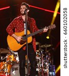Small photo of NASHVILLE, TN-JUN 10: Country singer Thomas Rhett performs in concert during the CMA Music Festival on June 10, 2017 at Nissan Stadium in Nashville, Tennessee.