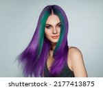 Small photo of Beauty fashion model girl with colorful dyed hair. Girl with perfect makeup and hairstyle. Model with perfect healthy smooth hair