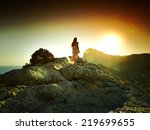Woman Silhouette At Sunset In...