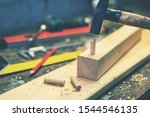 Small photo of woodworking - making wooden dowel joint