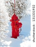 A Red Fire Hydrant In The Snow.