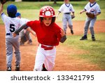 Youth Baseball Boy Running...