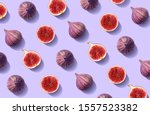Colorful fruit pattern of fresh figs on purple pastel background, top view, flat lay