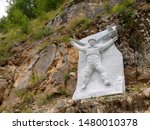 Small photo of VAGLI SOTTO, LUCCA, ITALY AUGUST 8, 2019: A statue to the courageous parachutists of ADRA, situated in the park of honour and dishonour near Vagli Lake.