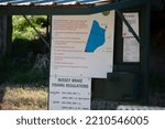 Small photo of BUSSEY BRAKE WILDLIFE MANAGEMENT AREA LOUISIANAUSA – FEBRUARY 28 2022: Signs explaining boating and fishing rules for the Bussey Brake Wildlife Management Area