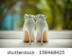 White Wedding Shoes With A Bow...