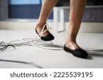 Small photo of Stumble And Fall Over Wire In Office