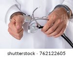 Close Up Of Arrested Doctor's...