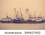 Fishing Boats In The Harbor In...