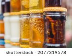 Small photo of An abundance of honey varieties in color, taste and density - beekeeping