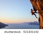 Rock Climber Resting While...