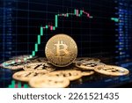Bitcoin and cryptocurrency investing concept with graph. Bitcoin cryptocurrency coins symbol. Trading on the cryptocurrency exchange. Trends in bitcoin exchange rates. Rise and fall chart of bitcoin.