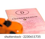 Small photo of Driving license with the imprint "Fuhrerschein", translation "driver's license" in germany