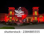 Small photo of Thackerville, Oklahoma - October 25th, 2023: Night colorful view of WinStar World Casino and Resort entrance.
