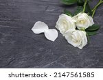 White Roses On A Dark Slate...