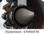 Small photo of The exhaust nozzle of a modern turbofan aircraft engine.