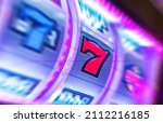 Small photo of Slot Machine Lucky Spin Conceptual Photo with Zoom Blur. Las Vegas Gambling Modern Slot Machines. Entertainment Industry Theme.