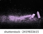 Small photo of Black Background With Light Pink Crushed Chalk. Small Pieces of Lilac School Chalk Lying on Spilled Powder. A Line Made of Crushed Pastel Pink Chalk. Flat Lay.