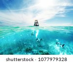 Scuba Divers Underwater And...