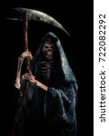 Small photo of High contrast image of the grim reaper with a scythe / mixed media.