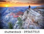  man in the Grand Canyon at sunrise. tourist in America