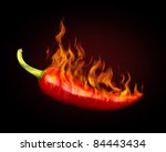 Red hot chili pepper on black background with flame