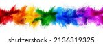 Small photo of colorful rainbow holi paint color powder explosion garland banner line isolated on white wide panorama background. peace rgb beautiful party concept