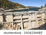 Small photo of BIG BEAR, CALIFORNIA - SEPTEMBER 25, 2016: Bear Valley Dam. The dam built in 1912 created Big Bear Lake, a recreation area and importat water source for San Bernardino.