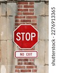 Stop no exit sign on post of a...