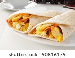 Two Bacon And Egg Burritos With ...