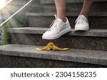 Small photo of Adult young male guy worker under food fruit skin fit sole hurry urban town city work house move forward idea concept. Closeup view boy jogger office trap job risky fault outdoor travel risk error fun