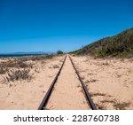 Steel Railroad Tracks On Sand...