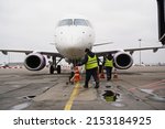 Small photo of Almaty, Kazakhstan - 03.16.2022 : The plane of the Mongolian airline Hunnu Air is parked at the airport site.