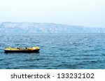Small Rubber Boat On The Ocean