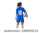  Portrait of young female soccer player standing with back with soccer ball standing on isolated Background.