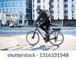 Male Courier With Bicycle...